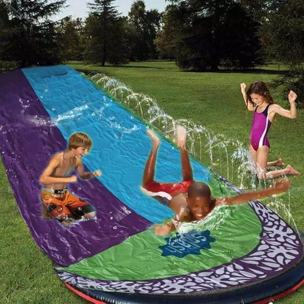 the children playing on ground waterslide with two rows